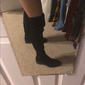 Thigh high black boots